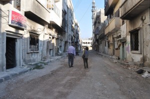 WFP staff in deserted streets of Baba Amer Homs Syria in June 2013 Photo WFP Laure Chadraoui
