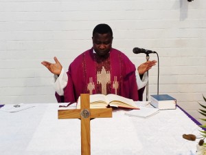 Rev. Fr. Stephen Kwasi Duodu leading the Congregation in prayers/Photo: WapsMedia