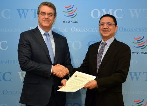 Nepal’s WTO ambassador, Deepak Dhital, presents his country’s TFA instrument of acceptance to DG Azevêdo/Photo: WTO
